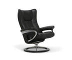 Poltrona reclinabile e poggiapiedi Stressless® Wing con base Signature - Nero