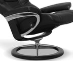 Poltrona reclinabile e poggiapiedi Stressless® Wing con base Signature - Nero